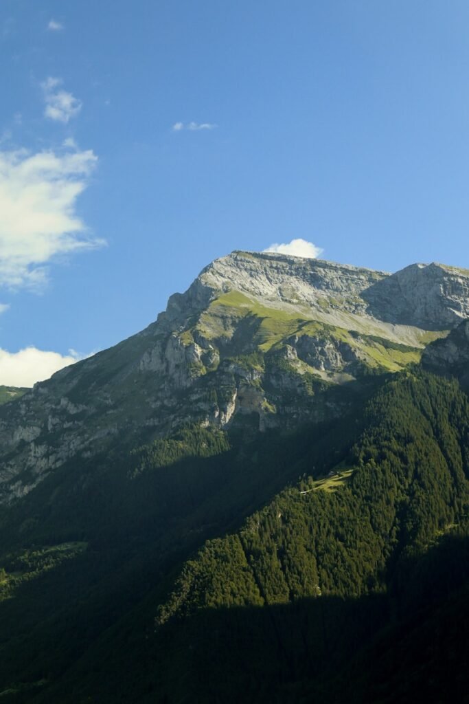 green and gray mountain under blue sky during daytime