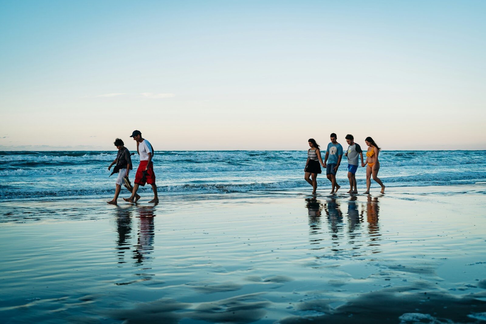 people on beach during daytime